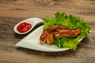 Roasted chicken white sausages with ketchup