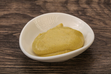 Dijon mustard sauce in the bowl