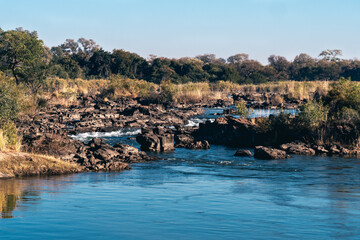 Fototapeta premium Popa Falls, Waterfall in Bwabwata National Park, Namibia
