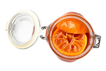 top view of tangerine jam (varenye) in open glass jar cutout on white background