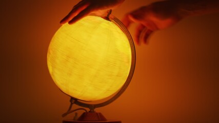 Pointing out travel destination on globe