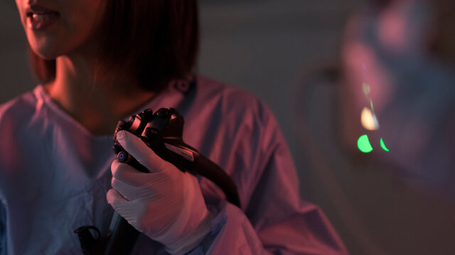 a gastroenterologist performs an endoscopy
