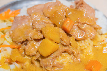 Curry and salad with pork cutlet.