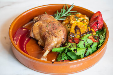 Hot fried chicken legs with grilled pineapple and Strawberry,Tomato with vegetable