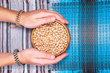 Uncooked dried chickpeas on table. Heap of legume chickpea. copyspace. flat lay