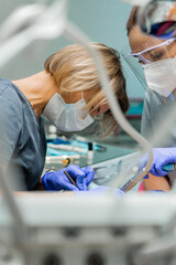 dentistry under general anesthesia. The dentist treats the patient under general anesthesia....