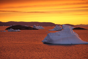 Greenland. Icebergs. Giant floating Iceberg from melting glacier. Global Warming and Climate Change.