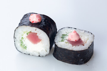 traditional Japanese cuisine. japanese sushi isolated on white background. maki sushi with salmon, avocado, soft cheese (Philadelphia)