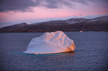 Greenland. Icebergs. Giant floating Iceberg from melting glacier. Global Warming and Climate Change.