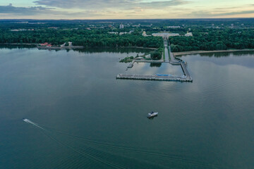 Panoramic aerial view of the Lower Park in Peterhof. Pier. The Gulf of Finland. Summer. Green trees.