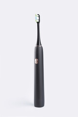 Smart electric toothbrush. Modern technology for health. Healthy teeth. Dentistry. Concept of professional oral care and healthy teeth by using ultrasonic smart toothbrush. 