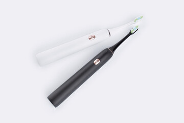 Smart electric toothbrush. Modern technology for health. Healthy teeth. Dentistry. Concept of professional oral care and healthy teeth by using ultrasonic smart toothbrush. 