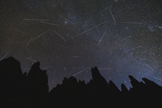 Geminids Meteor Shower over the Galayos granite spikes mountain peaks, Winter, Gredos, Avila, Spain