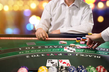 Man playing BlackJack at the casino