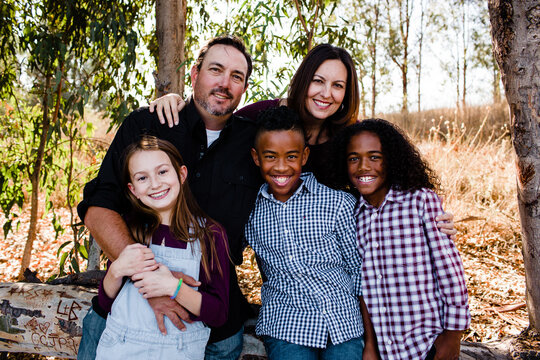 Family of Five Smiling for Camera at Park in Chula Vista