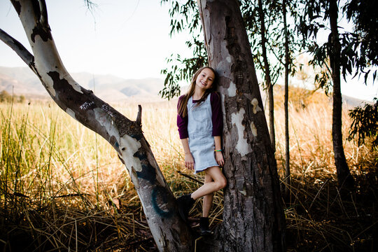 Young Girl Posing in Tree at Park in Chula Vista