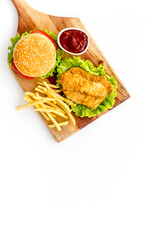 Delicious burgers with french fries and fried chicken. Flat lay, top view