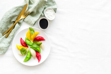Steamed dumplings tio view. Vegetables ravioli on white plate