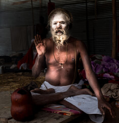 Indian Monk (Naga Sadhu baba) at Holy Ardh Kumbh Mela, in Allahabad (Prayagraj), Uttar Pradesh,...