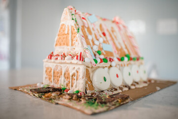 Finished gingerbread house on kitchen counter