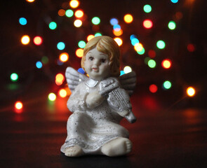 angel with christmas tree