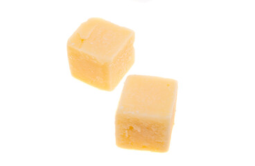 Aged cheese cubes isolated