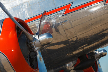 Close up view of a vintage propeller passenger and cargo airplane
