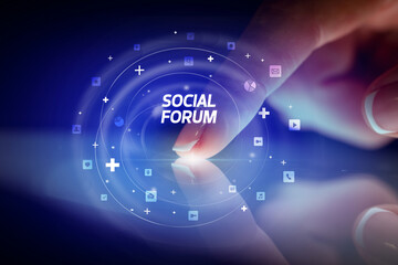 Finger touching tablet with social media icons and SOCIAL FORUM