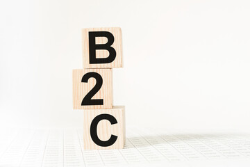 a word B2C on wooden cubes. business concept. business and Finance