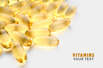 Omega-3 Fish Fat Oil Capsules. Fish oil capsules isolated on white background. Close up of capsules...