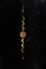 Golden moon phases on dark watercolor background. Beautiful gold moon cycle on night starry sky. Hand drawn illustration. High quality illustration for your design. 