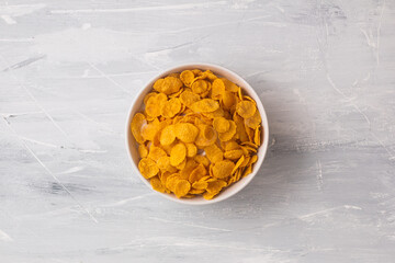 A bowl of corn flakes isolated