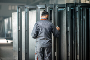 Worker with a digital tablet at the plant