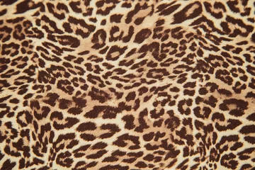  Leopard background pattern animal print leopard textile design fabric. Leopard skin seamless pattern. © Anna Žolnay