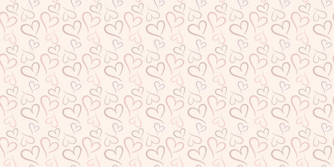 Pastel nude, brown hearts background.