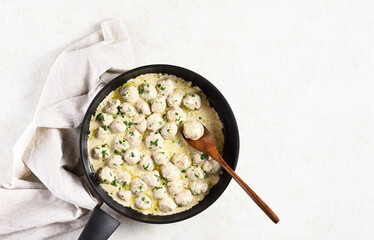 Swedish meatballs with white creamy sauce