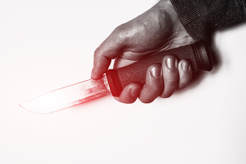 holding knife in hand with red glow concept crime