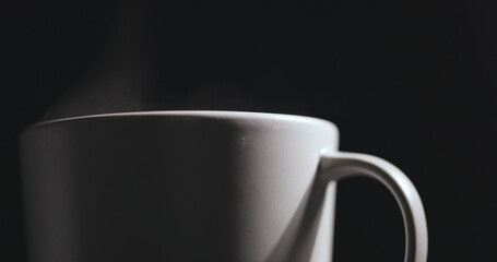 Vapor rising from hot mug closeup footage