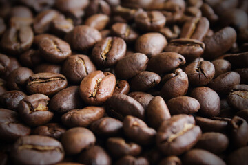 Roasted coffee beans. Close-up. Background. Texture.