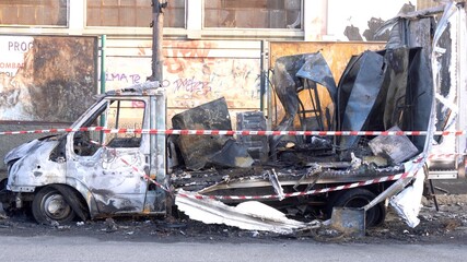 truck burned in the street after a fire - interior of car destroyed by fire