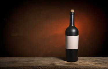 Fototapeta premium Glass of red wine standing on windowsill with autumn leaves and a fogged window in the background