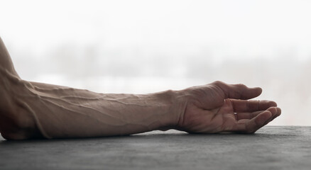 Strongly marked veins on the arm of an adult