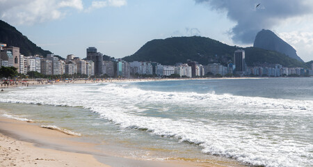  Citizens swim and sunbathe on the beach of Copacabana