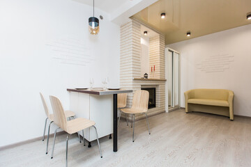 Interior photography luxury kitchen studio in loft style room in white, with kitchen furniture luxury