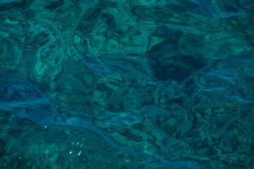 stains in the water from the sun