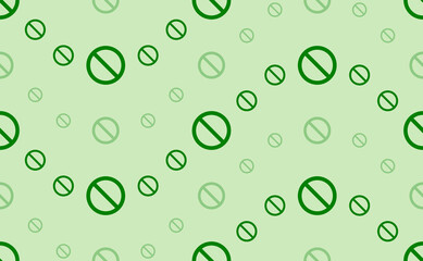 Seamless pattern of large and small green stop symbols. The elements are arranged in a wavy. Vector illustration on light green background