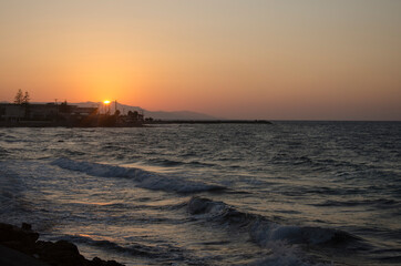 Fototapeta premium sunset over the sea, Gouves, Crete, Greece