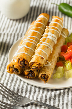 Homemade Mexican Chicken Flautas with Crema