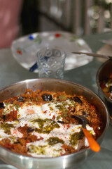 Quinoa and vegetable meal, served on the table outdoor. Selective focus.
