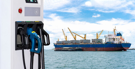 Electric station charger with plug and power cable supply and Large cargo ship for logistic import...